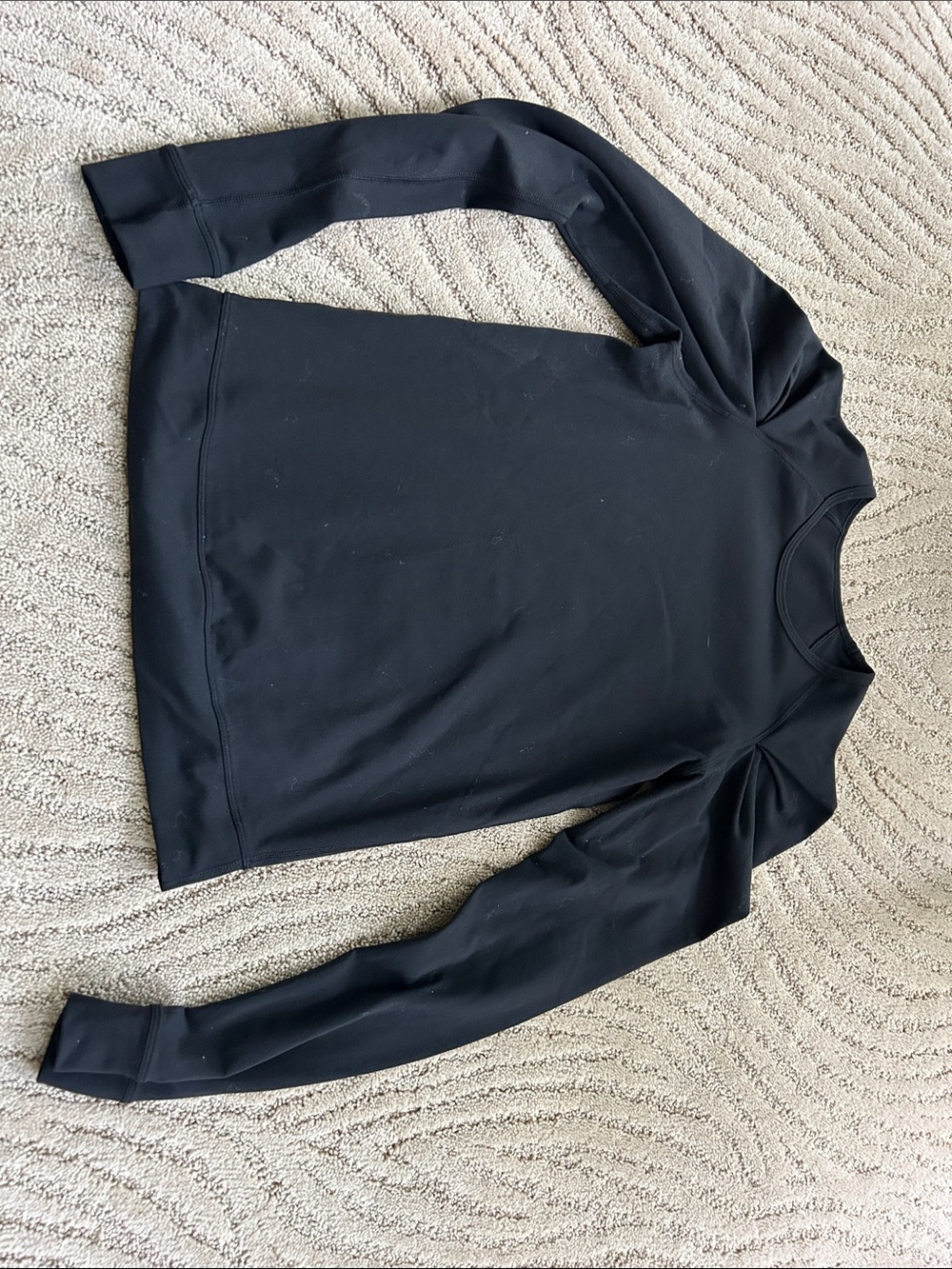 lululemon athletica Black Long-Sleeve Athletic Tee with ruched shoulders.